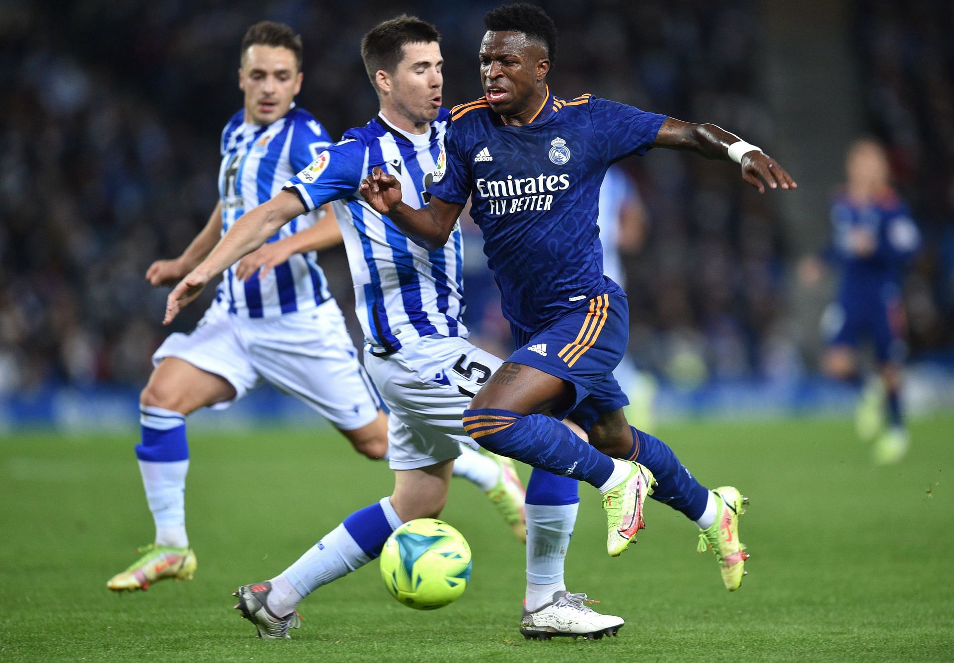 Vinicius Junior goes past Real Sociedad's backline.